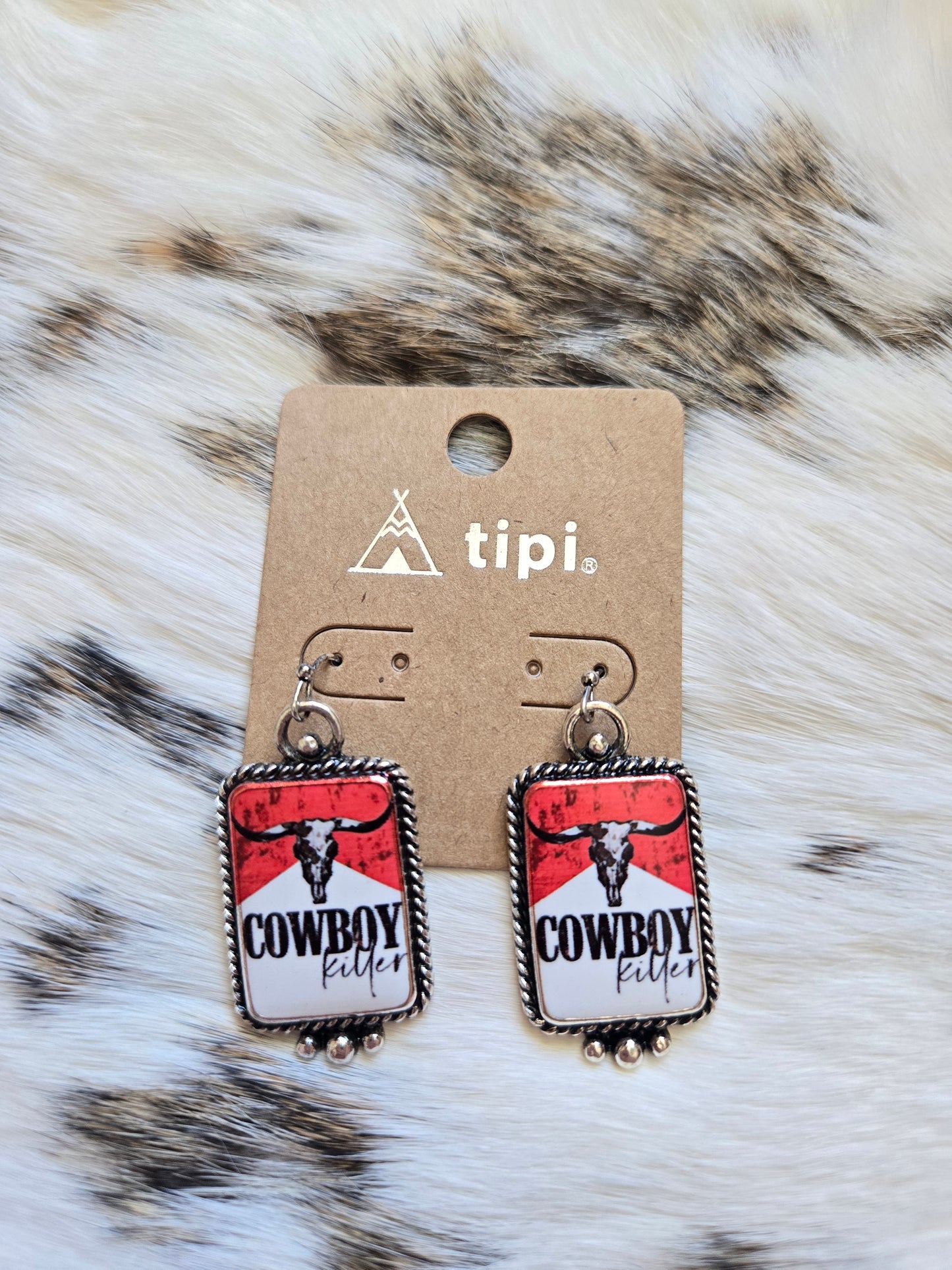Cowboy Killer dangles