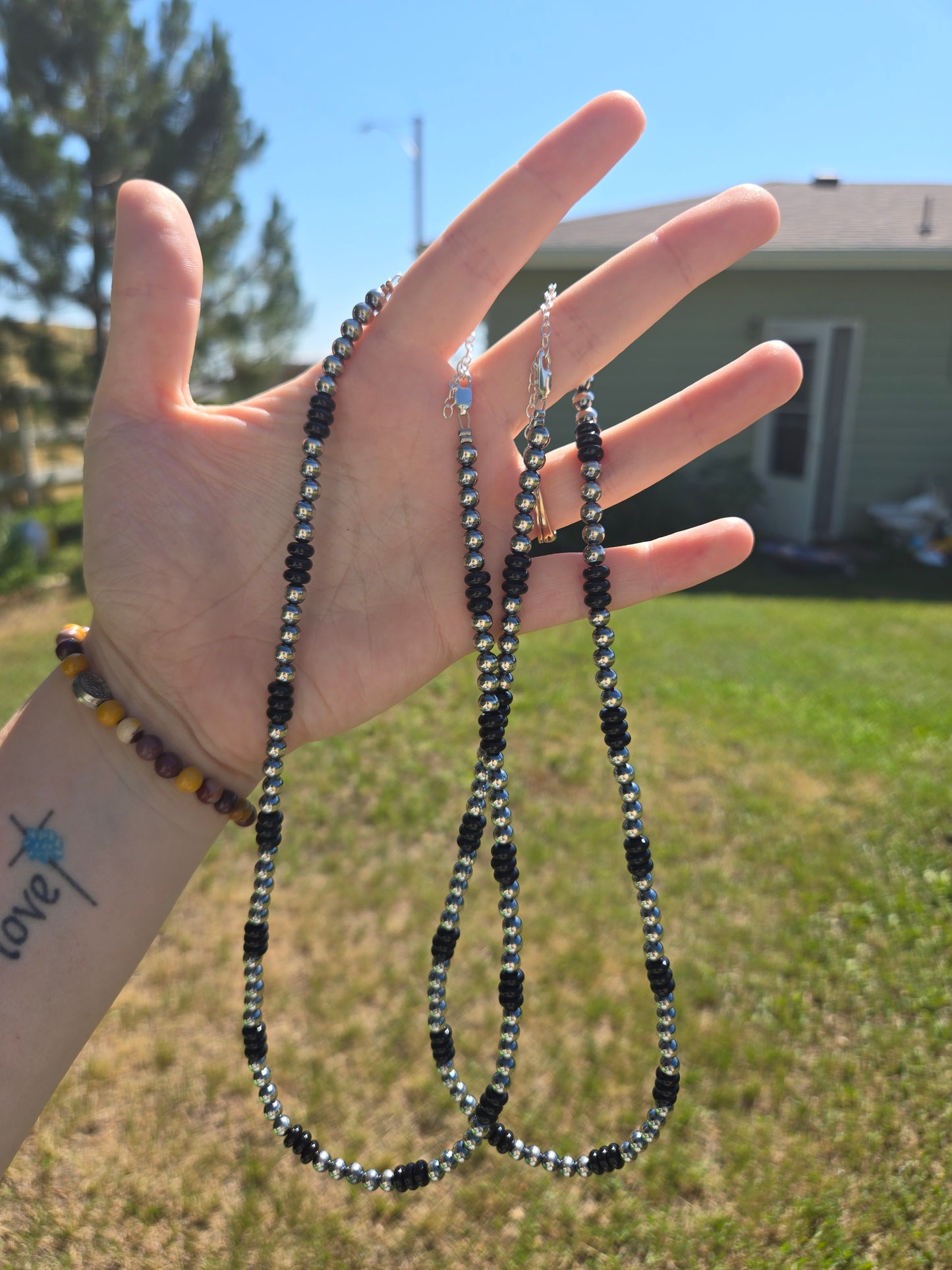 Sterling pearls and black onyx