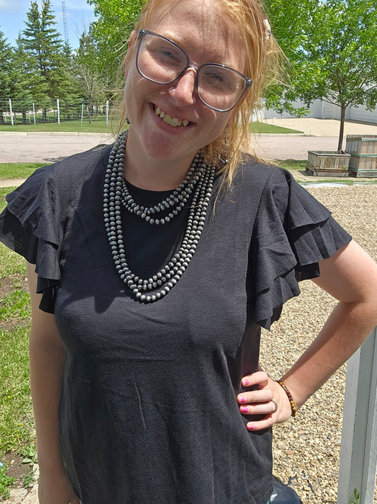 Black ruffle tee